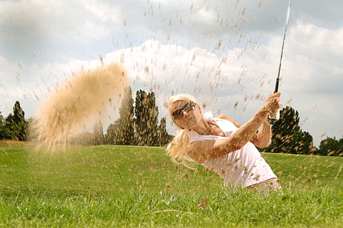 golf female back pain physiotherapy