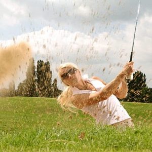 female golfer back pain physiotherapy